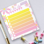 Pretty Simple Floral Pink Orange Yellow To Do List Notepad<br><div class="desc">This personalized To Do List notepad allows you to keep track of the things you need to do every day. The design consists of simple flowers in purple, pink and yellow on a white background and in the centre there are seven blank areas in shades of pink, orange and yellow...</div>