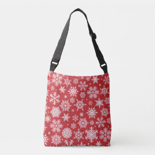 Pretty snowflakes on red background crossbody bag
