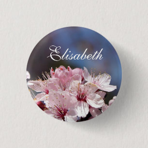 pretty spring pink cherry blossom in blue sky 1 inch round button