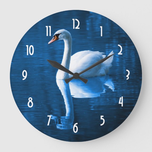 Pretty white swan floating on a blue lake large clock (Front)