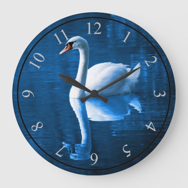 Pretty white swan floating on a blue lake large clock (Front)