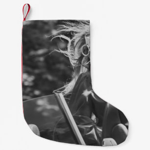 Pretty woman in convertible car small christmas stocking