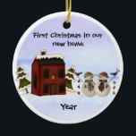 Primitive - First Christmas in our New Home Ceramic Ornament<br><div class="desc">This primitive style ornament will surely be one of your favourites. Above a red saltbox colonial house it says "First Christmas in our New Home" and has a snowman couple standing out front. Below them it has the year. On the back side is another snow couple and a place for...</div>