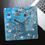 Printed Circuit Assembly PCB Blue Circuit Board Square Wall Clock<br><div class="desc">PCB Circuit Board gifts for geeks or gifts for nerds. Here's one for the Computer Nerd or Geeks in all of us. Geek Out your Nerd with this Printed Circuit Assembly PCB Electronic Circuit Board. This is a close up picture of a Printed Circuit Assembly PCB or electronic circuit board....</div>
