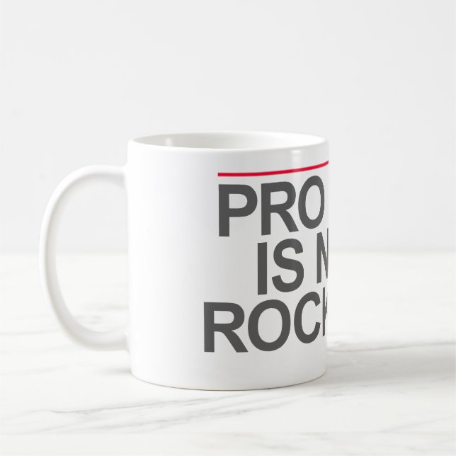 "PRO BONO IS NOT A ROCK STAR" -- COFFEE MUG (Left)