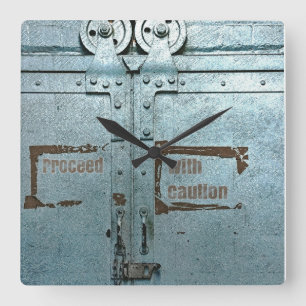 Proceed with caution blue grey industrial door square wall clock