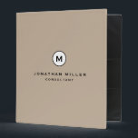 Professional Beige Monogram Initial Name & Title Binder<br><div class="desc">Modern professional binder features a minimal design in a simple beige colour palette with black and white accents. Custom name and title centred in a presented in a stylish simple font with a complimentary minimal monogram medallion. Shown with a custom name and monogram initial on the front in modern typography,...</div>