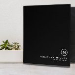 Professional Black White Monogram Initial Binder<br><div class="desc">Modern professional binder features a minimal design in a classic black and white color palette. Custom name presented in the lower right hand corner in stylish simple font with a complimentary minimal monogram medallion. Shown with a custom name and monogram initial on the front in modern typography, this personalized business...</div>