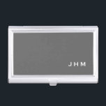 Professional Minimalist Grey Classic Monogram Business Card Holder<br><div class="desc">Professional business card holder features sleek minimalist design in a grey colour palette with white accents. Custom monogram initials presented on a simple grey background; positioned lower right hand corner. Shown with personalized monogram initials in a simple classic modern font, this executive business card holder is designed as a template...</div>
