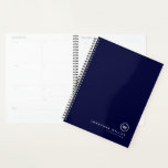 Professional Navy & White Monogram Initial Planner<br><div class="desc">Modern planner features a minimal design in a classic navy blue and white colour palette. Custom name presented in the lower right hand corner in stylish simple font with a complimentary minimal monogram medallion. Shown with a custom name and monogram initial on the front in modern typography, this personalized business...</div>