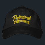 Professional Overthinker Funny Humor Embroidered Hat<br><div class="desc">Professional Overthinker Funny embroidered cap from Ricaso - Show off your sense of humor with the “Professional Overthinker” text-based design — perfect for anyone whose mind never quite switches off. Simple, bold typography delivers the joke instantly, making it relatable for thinkers, planners, worriers, and anyone who tends to analyze things...</div>