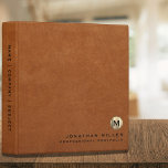 Professional Sable Leather Gold Monogram Portfolio Binder<br><div class="desc">Professional monogrammed portfolio binder features a modern design with brushed metallic gold monogram emblem on sable brown leather look textured background. Custom name presented in the lower right-hand corner in stylish simple font with a complimentary minimal monogram medallion. A modern binder for home or office, a professional monogrammed binder for...</div>