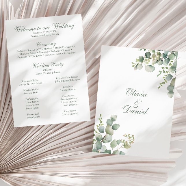 Programme de mariage au eucalyptus de la verdure m (Modern Greenery Eucalyptus Wedding Program on a sunny dry palm leaf.)