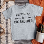 Promoted to Big Brother Matching Sibling Baby T-Shirt<br><div class="desc">Custom printed apparel personalized with "Promoted to Big Brother" graphic in trendy modern fonts with a boho arrow design. Perfect for a pregnancy announcement photo or a gift for older siblings when new baby arrives! Use the design tools to edit the colours or add your own text and photos to...</div>