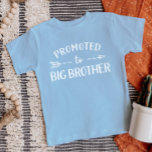 Promoted to Big Brother Pregnancy Announcement Baby T-Shirt<br><div class="desc">Custom printed apparel personalized with "Promoted to Big Brother" graphic in trendy modern fonts with a boho arrow design. Perfect for a pregnancy announcement photo or a gift for older siblings when new baby arrives! Use the design tools to edit the colours or add your own text and photos to...</div>