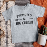 Promoted to Big Cousin Matching Family Baby T-Shirt<br><div class="desc">Custom printed apparel personalized with "Promoted to Big Cousin" graphic in trendy modern fonts with a boho arrow design. Perfect for a pregnancy announcement photo or a gift for older cousin when new baby arrives! Use the design tools to edit the colours or add your own text and photos to...</div>