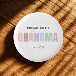 Promoted to Grandma EST 2025  1 Inch Round Button<br><div class="desc">Make the big announcement even more special with this charming “Promoted to Grandma EST 2025” button! Designed in gentle pastel colours on a clean white base, this pin is a meaningful keepsake for first-time or returning grandfathers. Perfect for baby reveals, pregnancy announcements, or baby shower favours, it’s easy to personalize...</div>