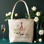 Prosecco Bubbly Watercolor Floral Bridesmaid Tote Bag<br><div class="desc">Toasting to love and laughter! Embrace the joyous spirit of your upcoming bridal shower with our enchanting bubbly prosecco and bouquet tote bag. We've meticulously hand-painted a charming pink champagne bottle and wine glass, adorned with delicate watercolor florals, to capture the elegance of this special occasion. Let your bridesmaids feel...</div>