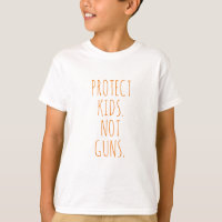 Protect kids Not guns orange handwritten text