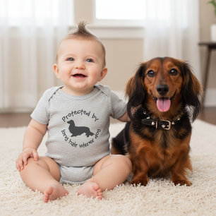 Protected by a Long Hair Wiener Dog Baby Outfit Bodysuit
