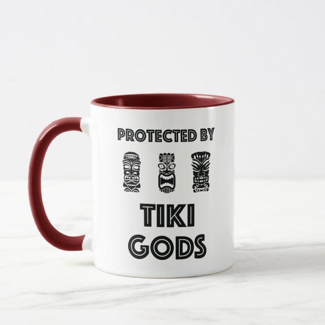 Protected by Tiki Gods Funny Tropical Mug (Left)
