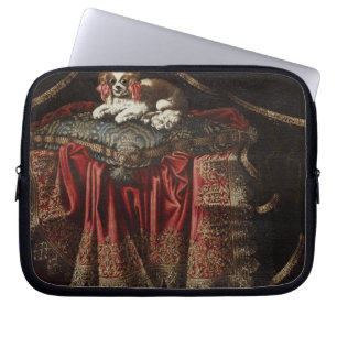 Protection Pour Ordinateur Portable Un épagneul posé sur un coussin brodé