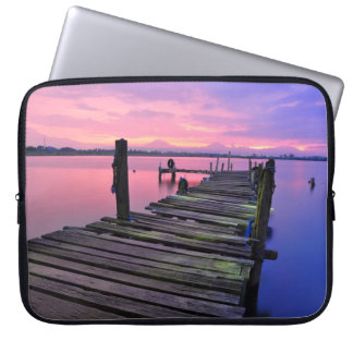 Protection Pour Ordinateur Portable Un pilier en bois