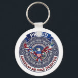 Proud American Air Force Daughter Keychain<br><div class="desc">This design features colorful American eagle with its wings widely spread. The eagle is located over the magic mandala and is decorated with the USA flag. The colorful text "Proud American Air Force Daughter" goes around the image. A beautiful family gift for a girl or woman. Do not forget to...</div>