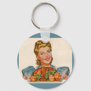proud housewife with her dinner creation keychain