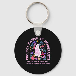 Proudly raised by immigrants butterfly floralProud Keychain
