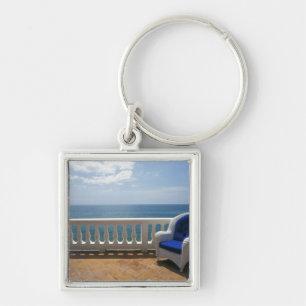 Puerto Rico. Wicker chair and tiled terrace at Keychain