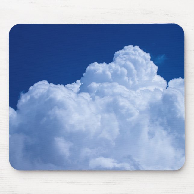 Puffy clouds in blue sky mouse pad (Front)