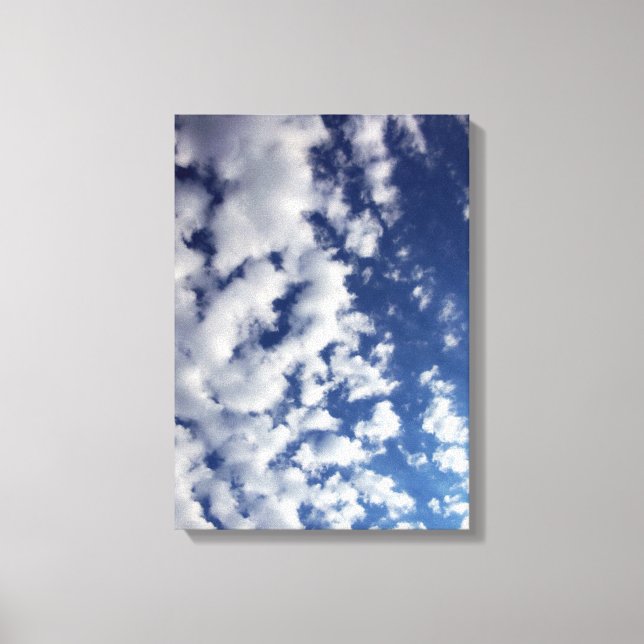 Puffy Clouds On Blue Sky Canvas Print (Front)