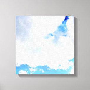 Puffy White Clouds and Blue Sky Canvas Print