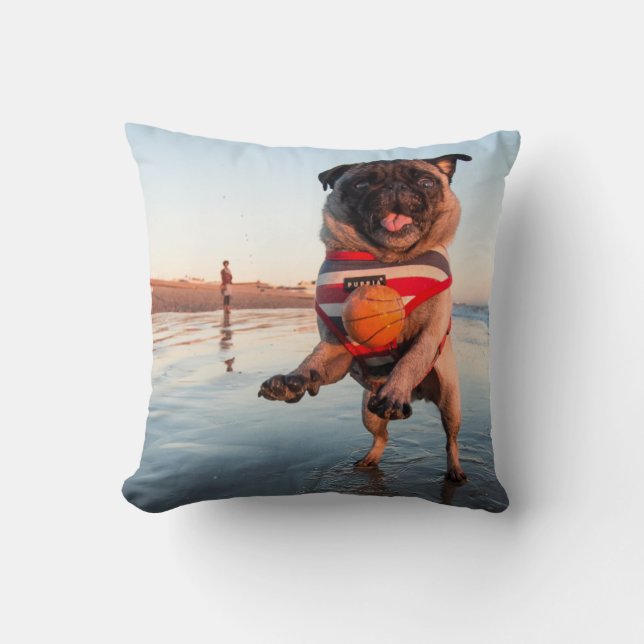 Pug Playing Ball on Beach Throw Pillow (Front)