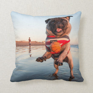 Pug Playing Ball on Beach Throw Pillow