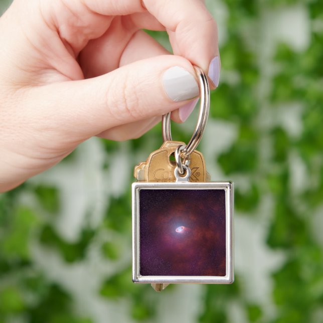 Pulsar Wind From A Neutron Star. Keychain (Hand)