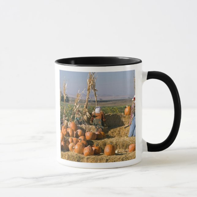 Pumpkin display with hay bales and scarecrows mug (Right)