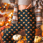 Pumpkin Pie Fall Thanksgiving Navy Leggings<br><div class="desc">Celebrate the season in style with these Pumpkin Pie Fall Thanksgiving Navy Leggings. Featuring a delightful pumpkin pie pattern against a deep navy background, these leggings offer a cozy yet playful design perfect for Thanksgiving gatherings or everyday fall wear. Enjoy the warmth and festive flair they bring to your fall...</div>