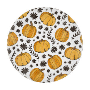 Pumpkin sketches: hand-drawn seamless pattern. cutting board