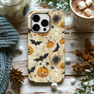 Pumpkins Ghosts and Bats on Warm Halloween Night iPhone 14 Pro Case