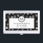 Puppy Dog Paws | Black & White | Grey Monogram Business Card Holder<br><div class="desc">Animal themed business card holder features a stylish and whimsical puppy dog paw print pattern with charcoal grey, light grey and white paw prints on a black background with custom name and title or role presented on a white banner with coordinating grey and black accents and text. Monogram initial presented...</div>