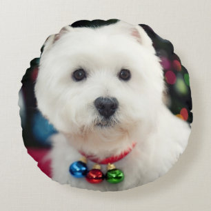 Puppy wearing Christmas bell on neck Round Pillow