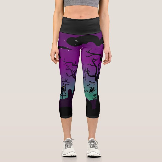 Purple and aqua blue haunted graveyard Halloween Capri Leggings (Front)