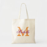 Purple and orange monogram wedding tote bags<br><div class="desc">Purple and orange wedding tote bag with personalized monogram. Vintage chic style monogrammed design. Customize for brides entourage; bridesmaids, flower girls, maid of honour, mother of the bride, mother of the groom, team bride, guests etc. Elegant script typography for name. Rustic name initial. Also nice for girls weekend bachelorette or...</div>