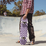 Purple and White Meander Skateboard<br><div class="desc">This bold, geometric, regal purple and white pattern is an original ornamental design. Purple diamonds with white borders are surrounded by royal purple meanders which angle around them. White zigzags separate the winding purple paths and offset diamonds.
Digitally created image.
Copyright © 2013 Claire E. Skinner. All rights reserved.</div>