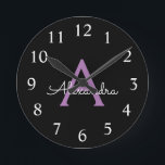 Purple Black Script Girly Monogram Name Round Clock<br><div class="desc">Purple and Black Simple Script Monogram Name Clock. This makes the perfect sweet 16 birthday,  wedding,  bridal shower,  anniversary,  baby shower or bachelorette party gift for someone that loves glam luxury and chic styles.</div>