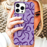 Purple Bow Monogram iPhone 16 Pro Max Case<br><div class="desc">Dress up your phone in style with this chic and trendy purple phone case! Featuring a playful pattern of hand-drawn bows and personalized with your monogram, this case is the perfect blend of fashion and function. Made from durable materials to protect your phone from everyday bumps and scratches. A great...</div>