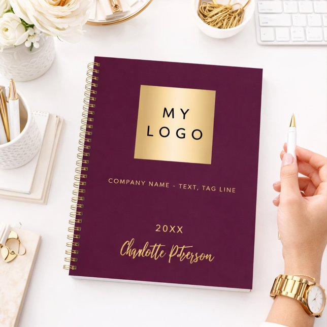 Purple business logo elegant monogram notebook (Creator Uploaded)