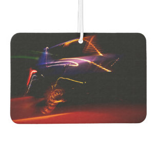 purple car dance air freshener